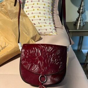 Beautiful Patricia Nash Brinlee Crossbody with tassel-oxblood color